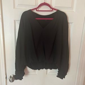 Black blouse statement sleeve detailing